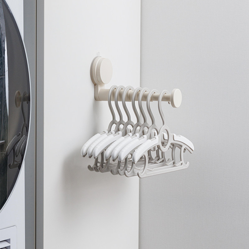 可伸缩奶油色吸盘衣架收纳架神器阳台壁挂家用免打孔衣架整理挂钩,淘宝优惠券,粉丝福利购,淘宝优惠卷