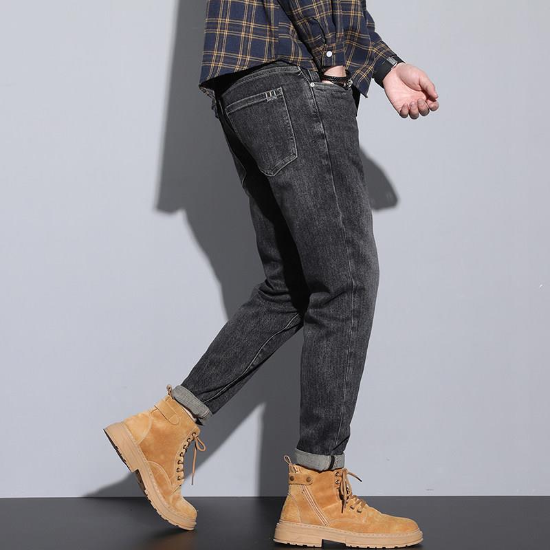 Men's jeans slim fit small feet spring and autumn 2026 new hot style Guangzhou Xintang Town stretch high-end pants autumn