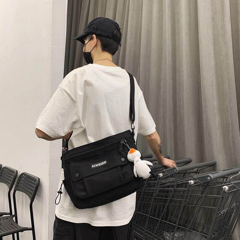 日系潮牌ins超火帆布包休闲斜挎包 尼麦男士包袋