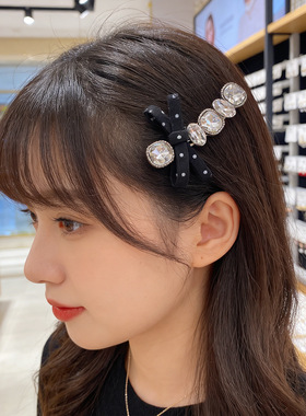黑色波点蝴蝶结水钻发夹