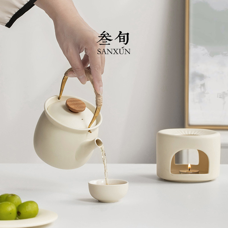 Thirty-year-old small porcelain teapot with raised beams