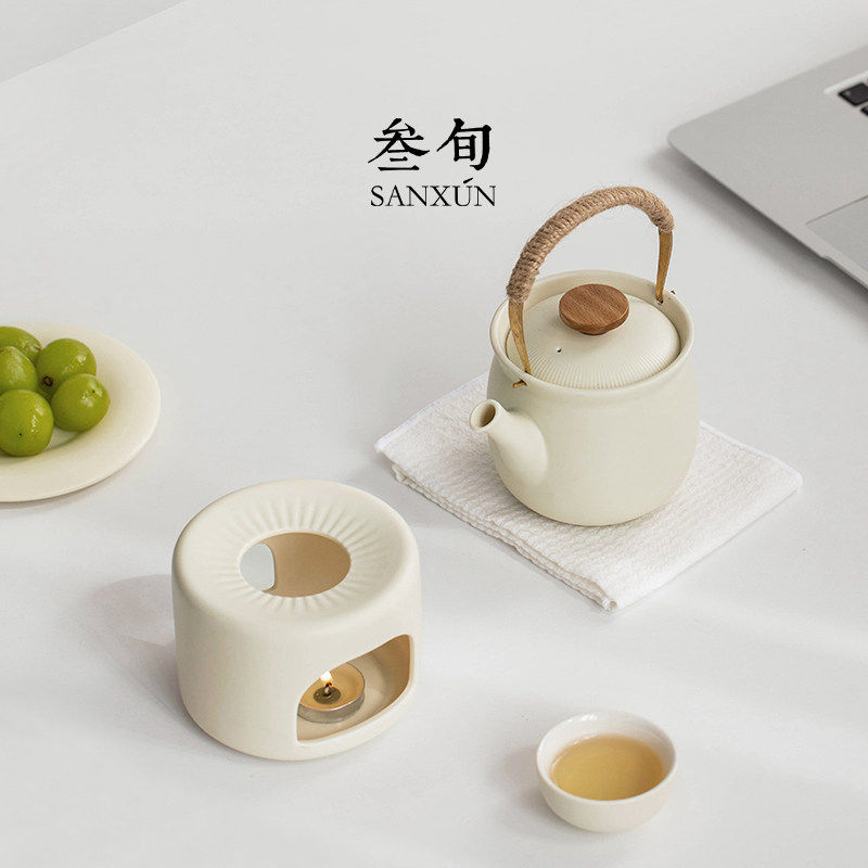 Thirty-year-old small porcelain teapot with raised beams