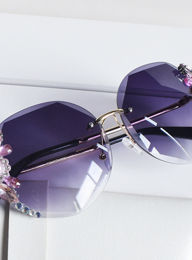 遮阳防晒显瘦无框太阳镜女