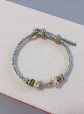 纯手工编织铃兰花桃花结手绳diy可穿路路通黄金转运珠饰品女手链