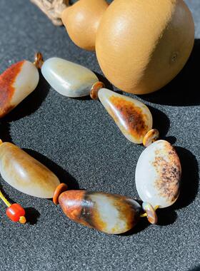 新疆和田玉籽玉手串时尚百搭精美手链红金皮白玉手链单圈