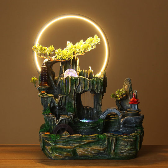 Brunnen mit Steingarten und fließendem Wasser zur Einweihungsfeier