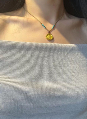 新中式古法錾刻黄财神圆牌朱砂黄金吊坠手工编织