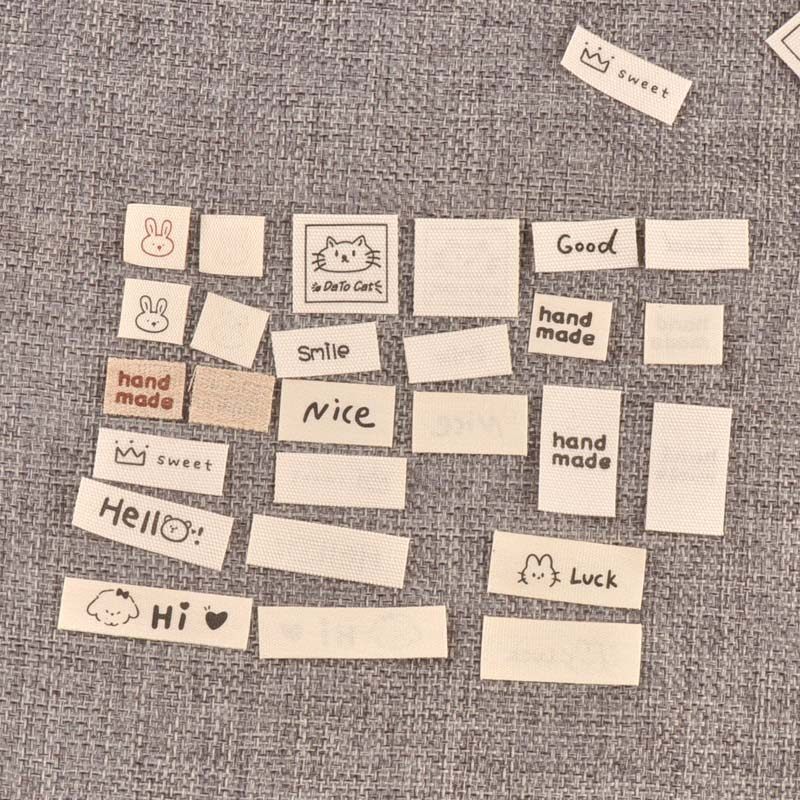 米色标签衣服服装领标手工制作折边布标DIY布贴服饰标签100个,淘宝优惠券,粉丝福利购,淘宝优惠卷