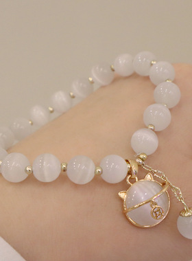 招桃花猫眼石水晶手环饰品女珍珠吊坠手链ins小众小福猫闺蜜手串