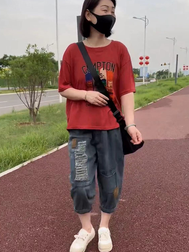 洋气时尚两件套装女2023年夏新款印花短袖T恤+薄款水洗牛仔哈伦裤,淘宝优惠券,粉丝福利购,淘宝优惠卷