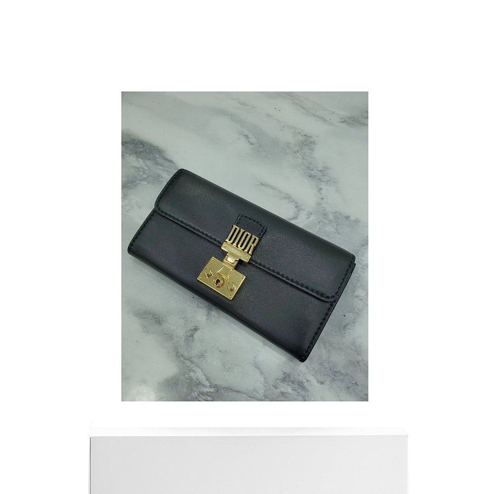  天猫国际探物中国香港手拿包