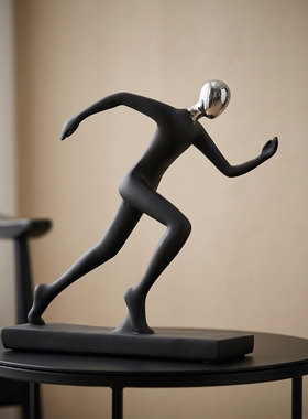 轻运动风黑色抽象人物雕塑摆件