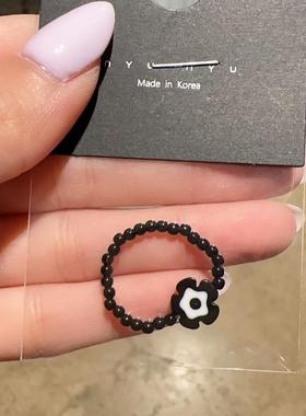 0825韩国东大门代购戒指nyunyu黑色花朵串珠戒指叠戴可爱早春指环