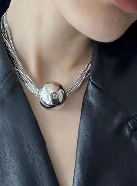 Stacked necklaces with geometric spheres and multi-layered