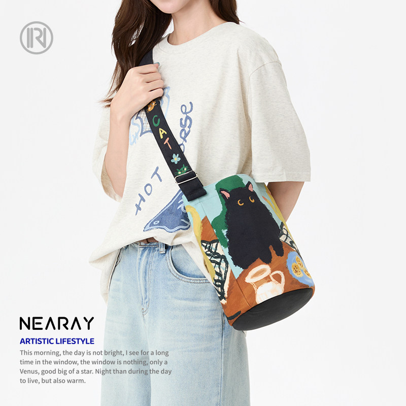 尼睿原创小煤球的下午茶可爱帆布包小众文艺百搭时尚水桶包Z054,淘宝优惠券,粉丝福利购,淘宝优惠卷