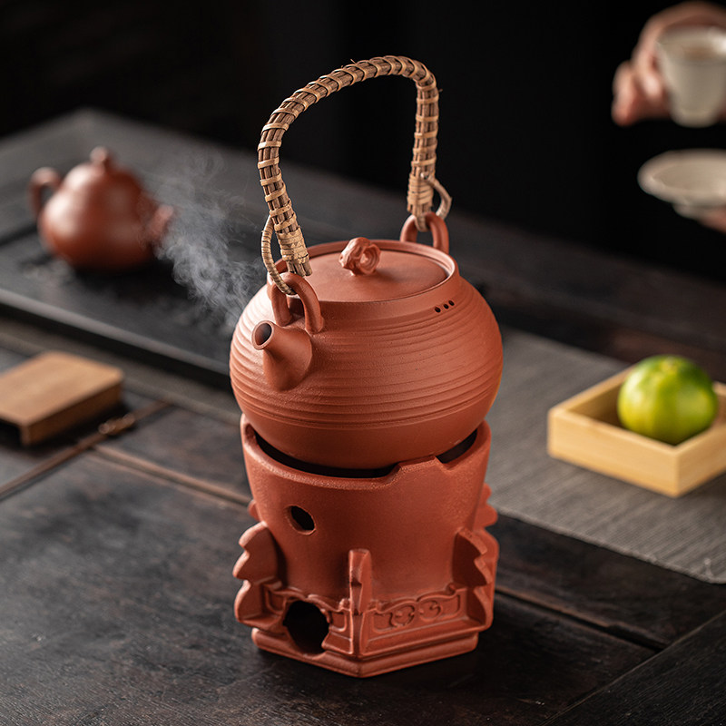 Tea stove, butter, household lifting kettle, clay pot, ancient method, open fire charcoal charcoal stove, outdoor camping, making tea around the stove
