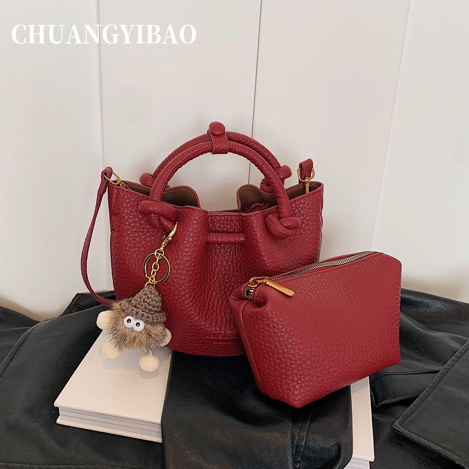 超火红色水桶包包女式2025新款潮轻奢小众手提包高级感单肩斜挎包,淘宝优惠券,粉丝福利购,淘宝优惠卷