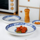 Plato de porcelana azul y blanco plato plato de cerámica para el hogar plato de arroz de color vidriado 2025 nuevo hotel vajilla plato grande comercial