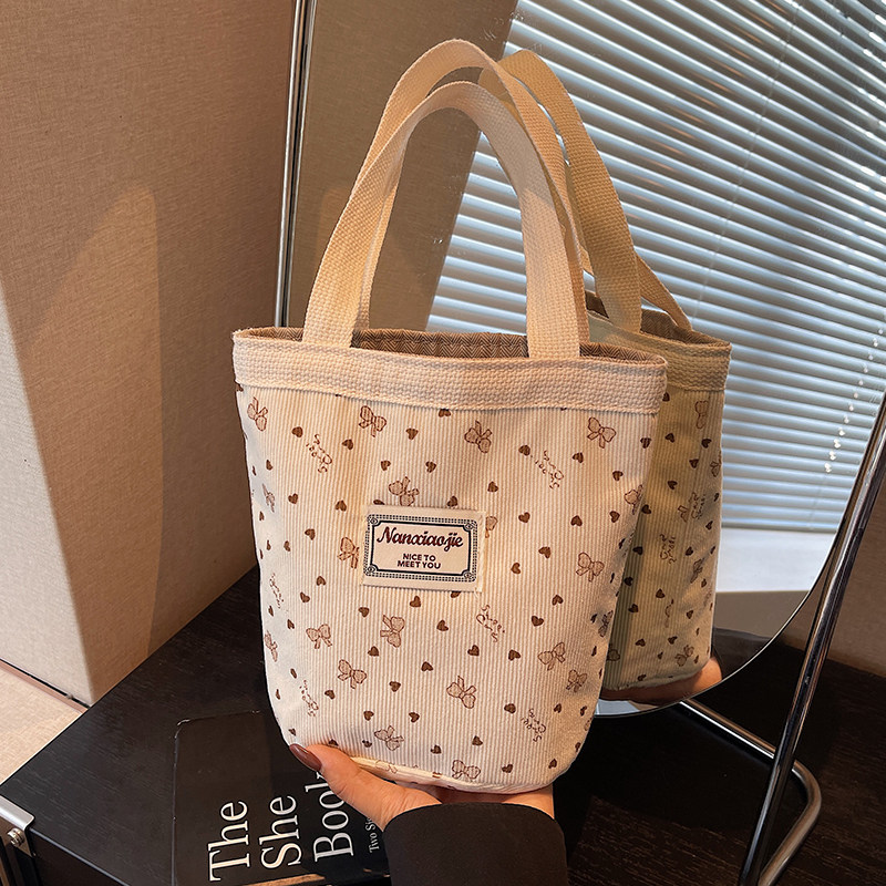 网红ins灯芯绒水桶包包女2025新款潮时尚手提包女洋气百搭手拎包,淘宝优惠券,粉丝福利购,淘宝优惠卷