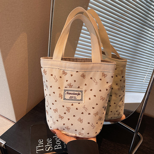 网红ins灯芯绒水桶包包女2025新款潮时尚手提包女洋气百搭手拎包 - 图1