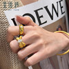 Elegant solid gold bow dove egg ring