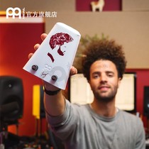 German Maier holds cow bell to hit musical instrument coowbell cow bells