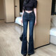 ແມ່ຍິງທີ່ມີແອວ V, hips plump ແລະ jeans bootcut sexy