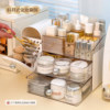 Integrated cosmetics storage slanted makeup brush barrel