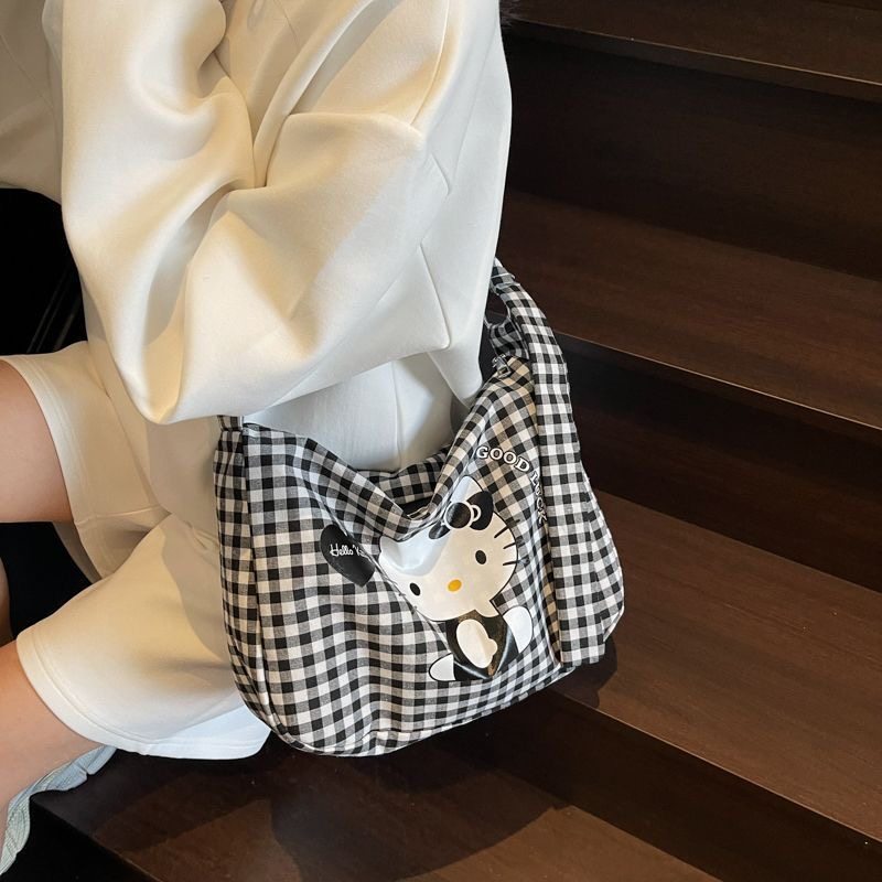 高颜值可爱hellokitty新款斜挎包女帆布包大容量格子学生上课背包,淘宝优惠券,粉丝福利购,淘宝优惠卷