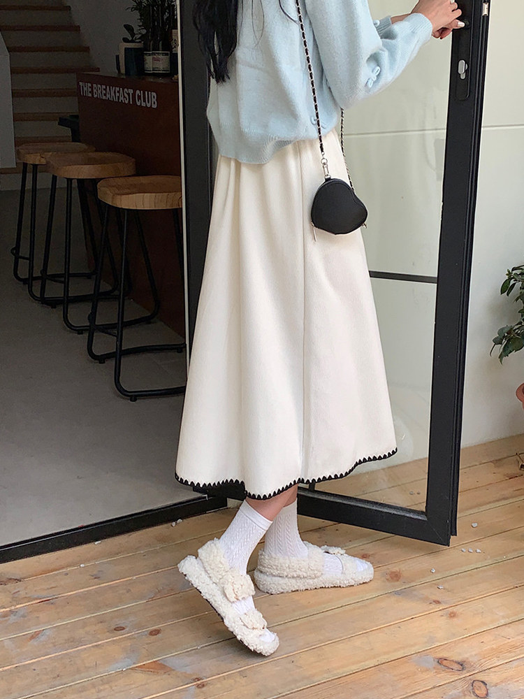 米白色针织秋冬设计感别致潮半身裙 樱米萱半身裙