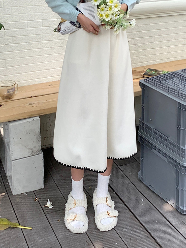 米白色针织秋冬设计感别致潮半身裙 樱米萱半身裙