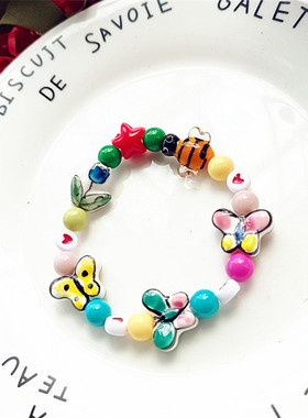 陶瓷蜜蜂蝴蝶花朵彩色珠子手链女