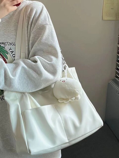 High-end versatile women's bag 2025 new cross-body portable commuter tote bag large capacity student school shoulder bag