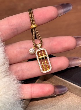 925纯银新中式复古国风算盘钻球如意棕绳抽拉项链时尚高级感设计