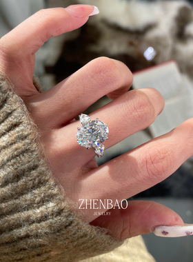 7克拉V金水滴三石椭圆钻戒女