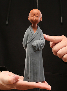 可爱风紫砂家居客厅茶艺小沙弥