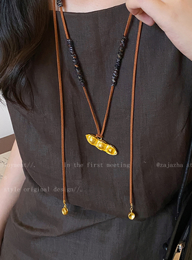 豌豆麂皮编织长款抽拉项链