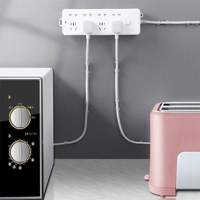 Insert and row fixer wall-mounted storage rack without punching, powerful socket plug board router fixing wall stickers