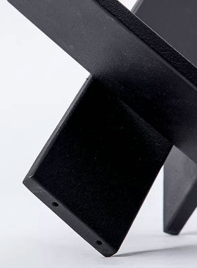 现代简约金属黑色喷砂交叉折叠摆