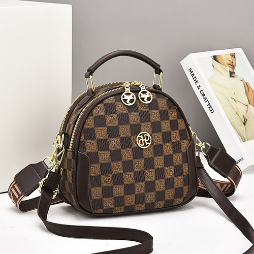 斜挎包女2026新款百搭休闲小圆包宽肩带日常上班通勤手提包小拎包 - 图0