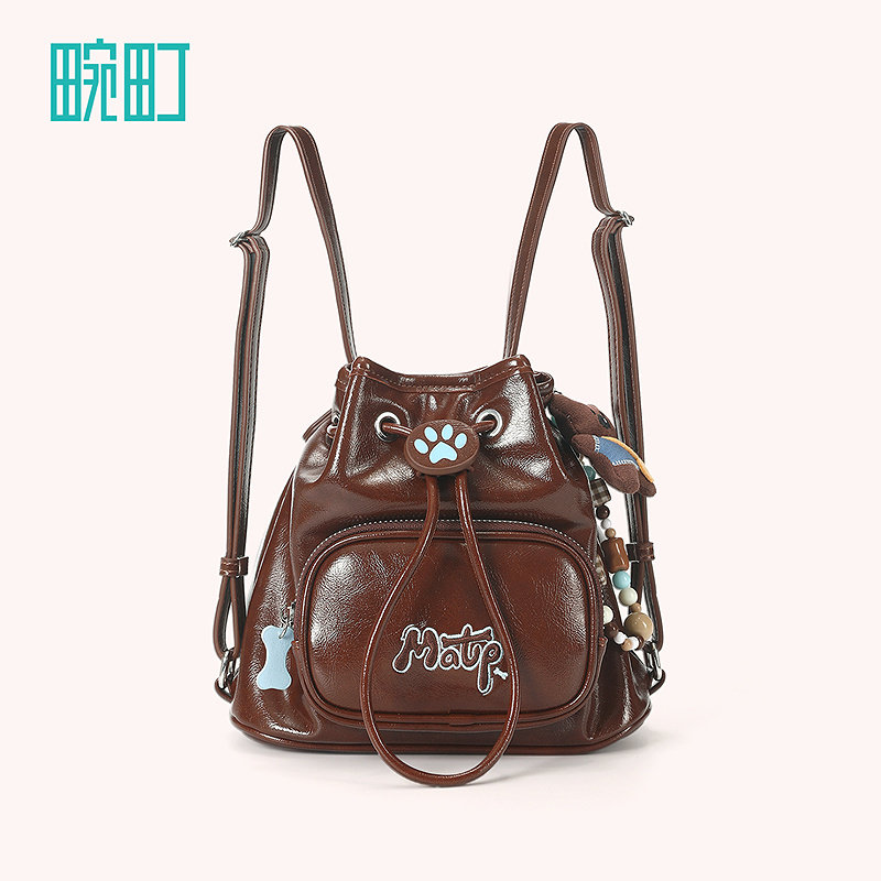 畹町焦糖可露丽油蜡皮包女秋冬复古蓝棕单双肩通勤女包抽绳水桶包,淘宝优惠券,粉丝福利购,淘宝优惠卷