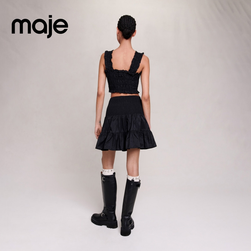 Maje Outlets春夏女装法式气质黑色松紧收腰A字褶皱短款半身裙