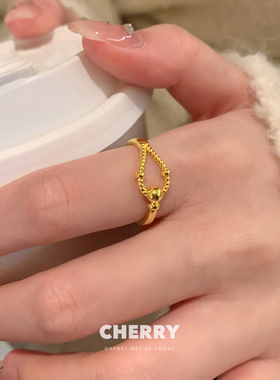 黄金色弹簧马蹄扣戒指女