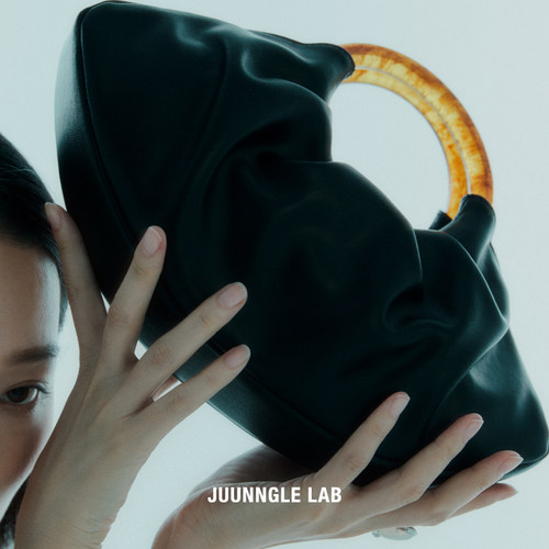 Juunngle洲谷鲁伯特牛角包包新中式云朵包女士高级感牛皮小手包潮 - 图1
