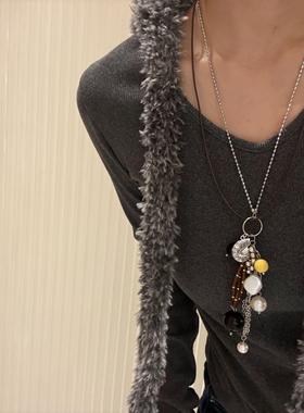 义乌市陌然饰品有限公司乌托邦系列金属海螺流苏长款小众设计黑猪