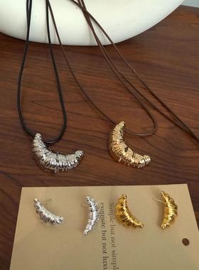 义乌市陌然饰品有限公司韩系牛角包黑色皮绳项链女新款百搭气质长