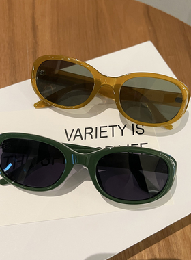 度假辣妹椭圆形猫眼显脸小墨镜