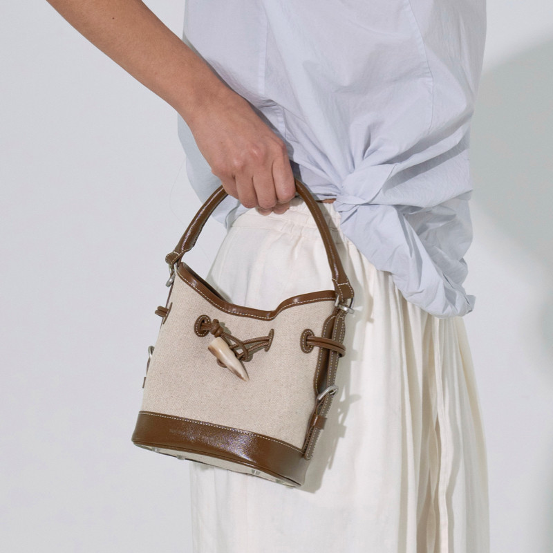 the pleasure molecule牛角桶包mini头层牛皮帆布水桶包手提斜挎,淘宝优惠券,粉丝福利购,淘宝优惠卷