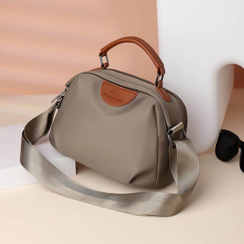 尼龙帆布斜挎包女式2025新款时尚妈妈包休闲牛津布单肩贝壳小包包,淘宝优惠券,粉丝福利购,淘宝优惠卷