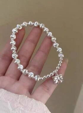 幂琳999纯银手链女银珠手串手工弹力绳简约圆珠猫眼女新款铃铛